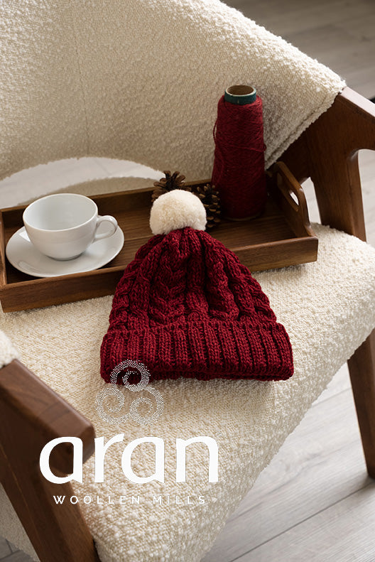 Aran Strickmütze aus Merinowolle mit Bommel