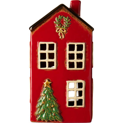 Teelichthaus Stillenat mit Tannenbaum vor dem Haus